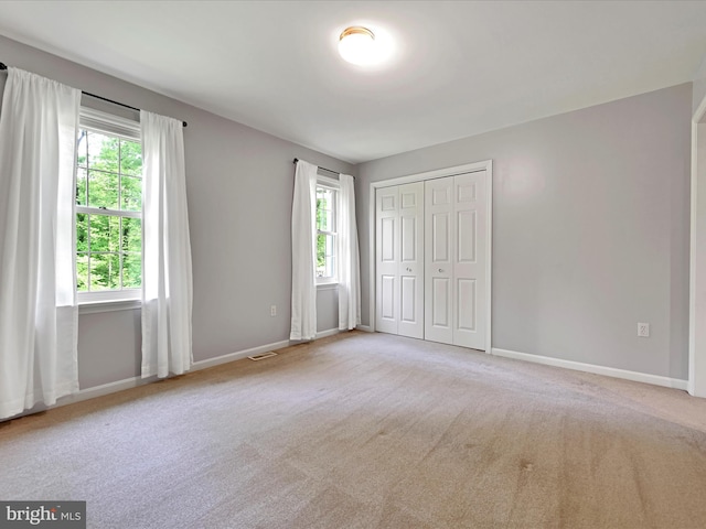 320 N Ridge Rd, Reinholds, PA 17569 - unfurnished bedroom with carpet, baseboards, and a closet