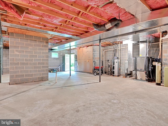 320 N Ridge Rd, Reinholds, PA 17569 - basement with heat pump water heater, a water softener system, heating unit, and concrete block wall