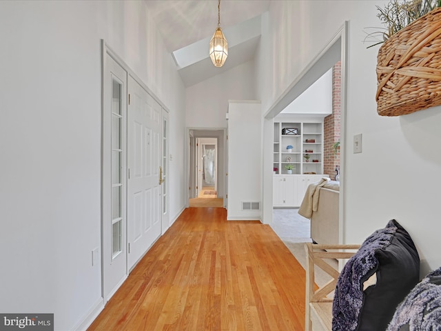 320 N Ridge Rd, Reinholds, PA 17569 - foyer entrance with light wood-type flooring, high vaulted ceiling, and baseboards