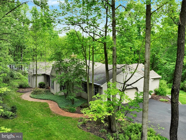 320 N Ridge Rd, Reinholds, PA 17569 - view of front of home with driveway, roof with shingles, and a garage