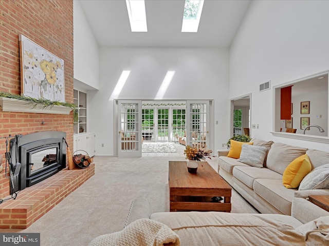 320 N Ridge Rd, Reinholds, PA 17569 - carpeted living room featuring high vaulted ceiling and a skylight