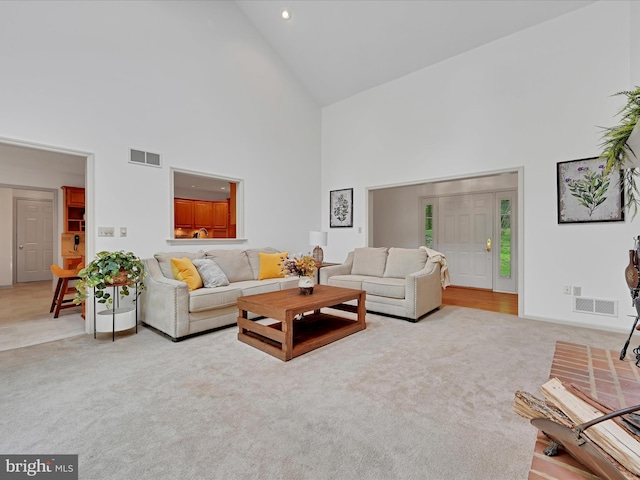 320 N Ridge Rd, Reinholds, PA 17569 - living area with high vaulted ceiling, carpet, recessed lighting, and baseboards