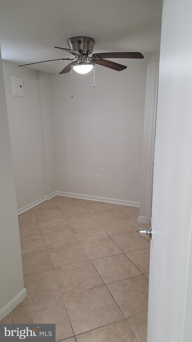 15030 Alabama Ave, Woodbridge, VA 22191 - spare room with ceiling fan, light tile patterned floors, and baseboards