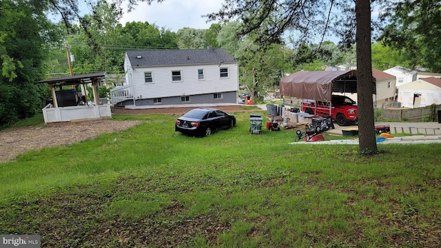 15030 Alabama Ave, Woodbridge, VA 22191 - back of house featuring a lawn