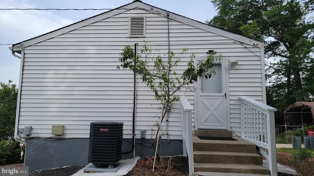 15030 Alabama Ave, Woodbridge, VA 22191 - rear view of house with central air condition unit