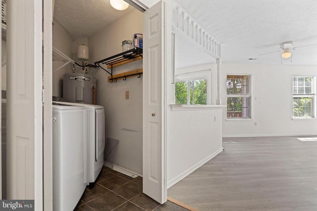 31 Beagle Run Unit 88, Nottingham, MD 21236 - washroom featuring water heater, a textured ceiling, a ceiling fan, baseboards, and washer and clothes dryer