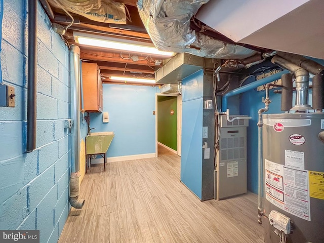 12419 Balston Rd, Philadelphia, PA 19154 - unfinished below grade area featuring water heater, heating unit, wood finished floors, and a sink