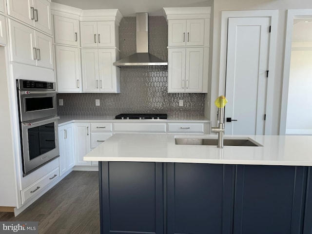 505 Trifecta Rd Unit 373, Downingtown, PA 19335 - kitchen featuring wall chimney exhaust hood, a sink, black gas cooktop, double oven, and dark wood-style flooring