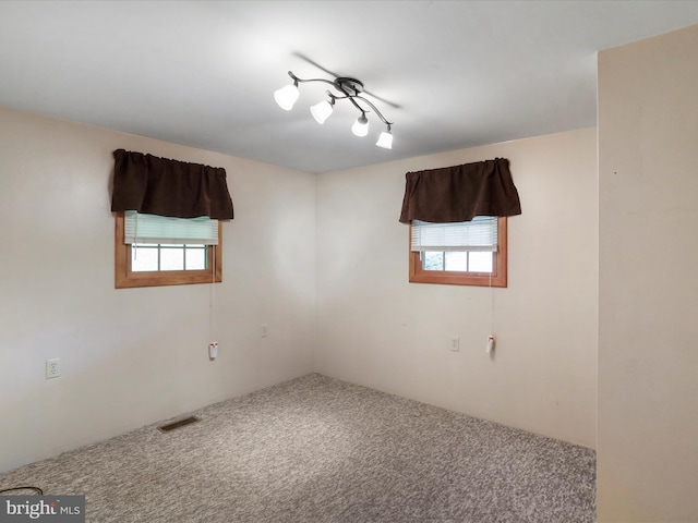 12417 Mount Savage Rd, Mount Savage, MD 21545 - carpeted empty room featuring healthy amount of natural light