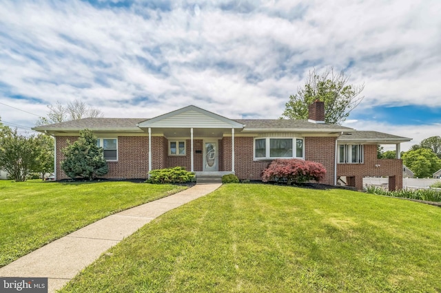 1143 Villanova Ave, Swarthmore, PA 19081 - ranch-style home with a front yard, brick siding, and a chimney