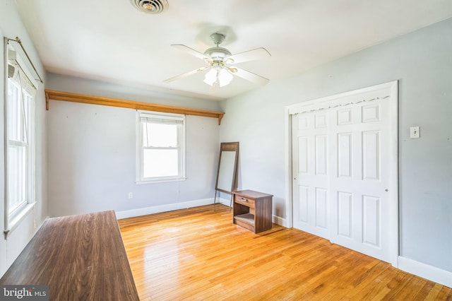 1143 Villanova Ave, Swarthmore, PA 19081 - unfurnished bedroom featuring hardwood / wood-style flooring, a closet, baseboards, and ceiling fan