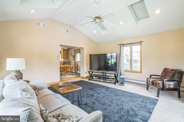 1143 Villanova Ave, Swarthmore, PA 19081 - carpeted living area with a baseboard heating unit, vaulted ceiling, a ceiling fan, recessed lighting, and a baseboard radiator
