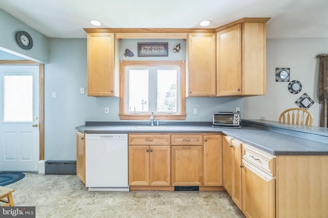 1143 Villanova Ave, Swarthmore, PA 19081 - kitchen featuring dishwasher, a sink, a peninsula, and dark countertops