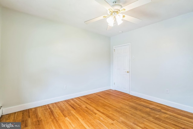 1143 Villanova Ave, Swarthmore, PA 19081 - unfurnished room featuring baseboards, a ceiling fan, light wood-style floors, and baseboard heating