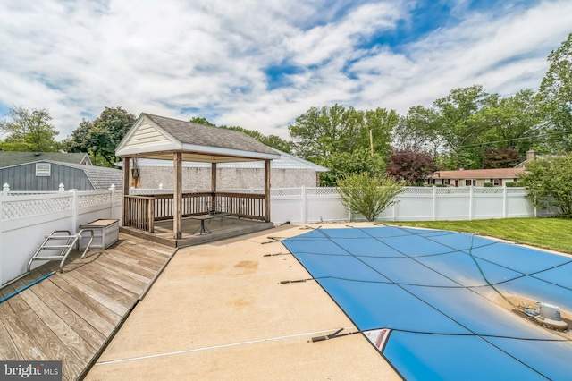 1143 Villanova Ave, Swarthmore, PA 19081 - view of swimming pool with a gazebo, a deck, and a fenced backyard