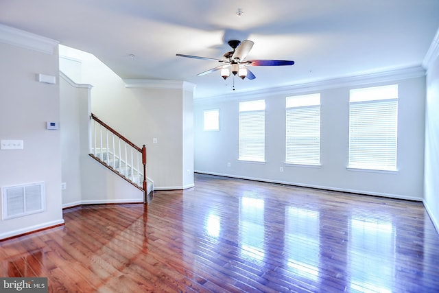 6300 Santo Pl, Capitol Heights, MD 20743 - unfurnished living room with ornamental molding, stairway, a ceiling fan, wood finished floors, and baseboards