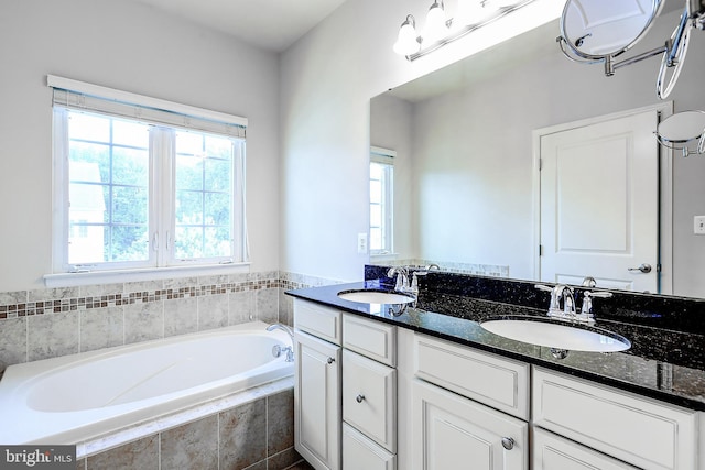 6300 Santo Pl, Capitol Heights, MD 20743 - bathroom with double vanity, a bath, and healthy amount of natural light