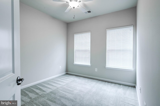 6300 Santo Pl, Capitol Heights, MD 20743 - spare room featuring carpet, a ceiling fan, and baseboards