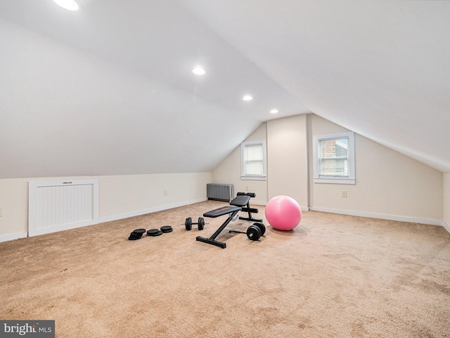 exercise area with lofted ceiling, carpet, baseboards, and recessed lighting