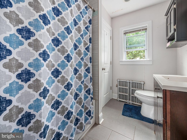 full bath with radiator, vanity, tile patterned floors, toilet, and a shower with curtain