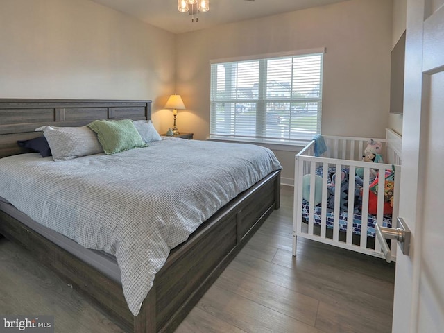 bedroom with wood finished floors