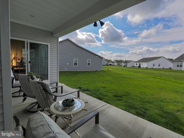 view of patio / terrace with a residential view