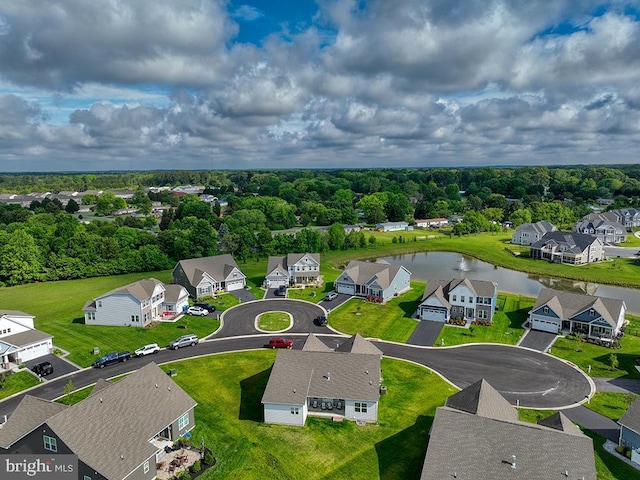 aerial view of residential area with a nearby body of water