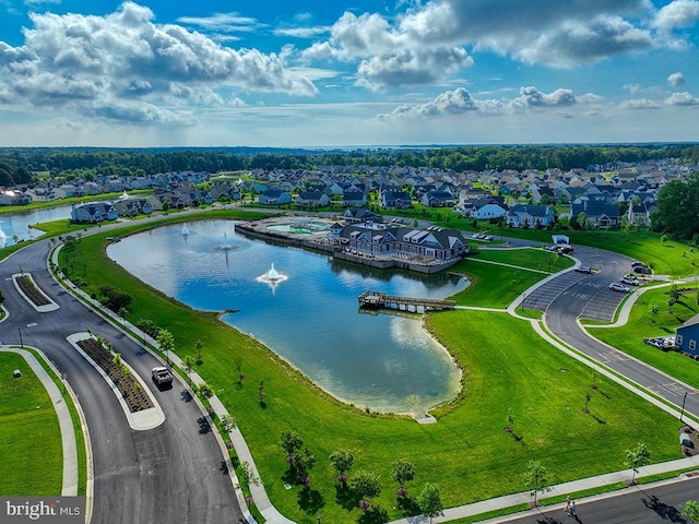 aerial view of residential area with a nearby body of water