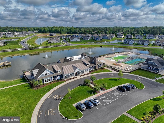 aerial perspective of suburban area featuring a large body of water