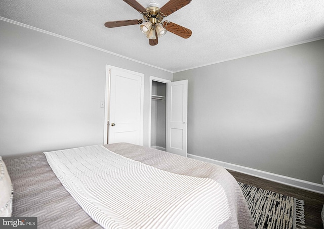 3565 Benzinger Rd, Baltimore, MD 21229 - bedroom with wood finished floors, a closet, ornamental molding, a textured ceiling, and a ceiling fan