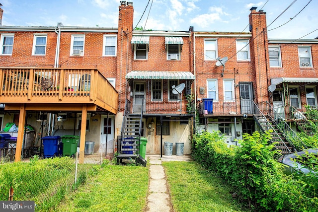 3565 Benzinger Rd, Baltimore, MD 21229 - rear view of property with stairs, a chimney, and a deck