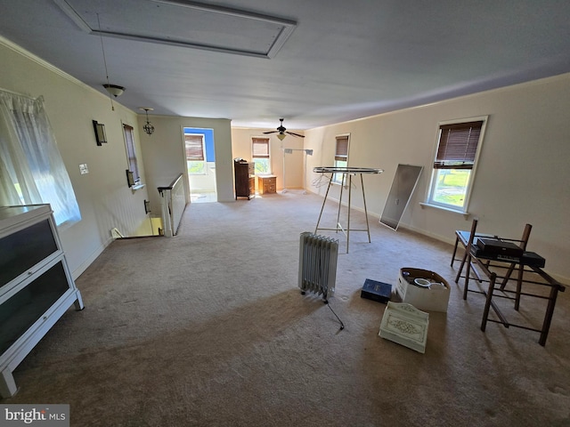 26689 Mariners Rd, Crisfield, MD 21817 - living area featuring attic access, healthy amount of natural light, crown molding, and carpet flooring