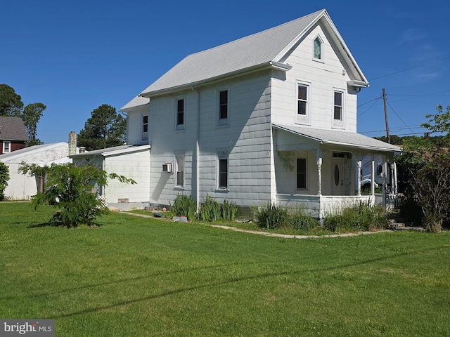 26689 Mariners Rd, Crisfield, MD 21817 - view of front of home featuring covered porch and a front lawn