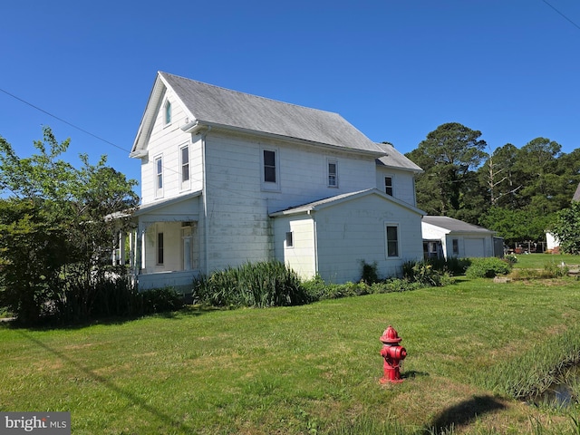 26689 Mariners Rd, Crisfield, MD 21817 - view of side of home featuring a lawn