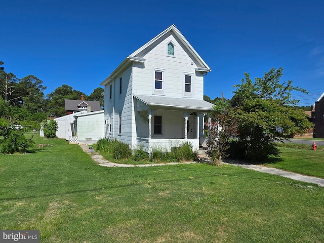 26689 Mariners Rd, Crisfield, MD 21817 - view of front of house with covered porch and a front lawn