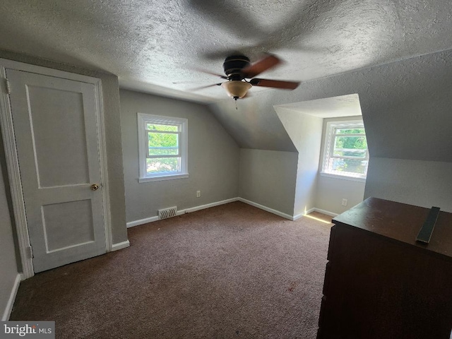 2803 New Falls Rd, Levittown, PA 19056 - bonus room featuring a ceiling fan, baseboards, lofted ceiling, healthy amount of natural light, and a textured ceiling