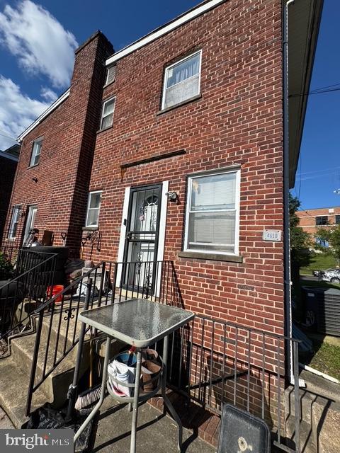4610 6th St SE, Washington, DC 20032 - back of house featuring brick siding