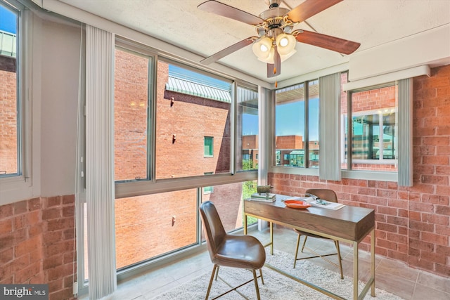 1001 N Vermont St Unit 812, Arlington, VA 22201 - tiled home office featuring ceiling fan, healthy amount of natural light, and brick wall
