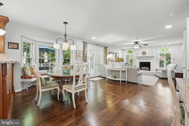 8346 Argent Cir, Fairfax Station, VA 22039 - dining area with dark wood-type flooring, a ceiling fan, recessed lighting, french doors, and a fireplace