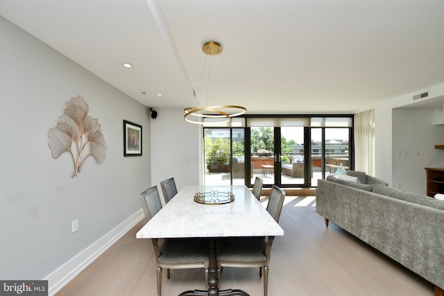 2818 Connecticut Ave NW Unit 503, Washington, DC 20008 - dining area with light wood-type flooring, expansive windows, baseboards, and recessed lighting