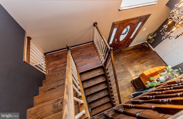 6300 Mallard Ln, Lothian, MD 20711 - staircase featuring wood finished floors and baseboards