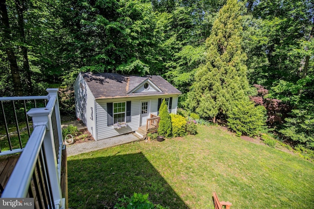6300 Mallard Ln, Lothian, MD 20711 - view of front facade featuring a front lawn and a shingled roof