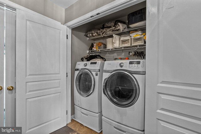 laundry room featuring separate washer and dryer