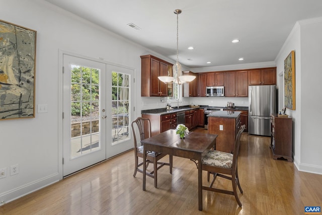 3080 Morewood Ln, Charlottesville, VA 22901 - dining area featuring wood finished floors, crown molding, french doors, baseboards, and recessed lighting