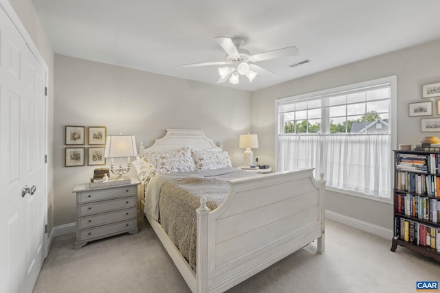 3080 Morewood Ln, Charlottesville, VA 22901 - bedroom featuring light colored carpet, baseboards, a ceiling fan, and a closet
