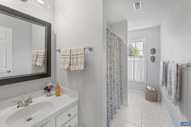 3080 Morewood Ln, Charlottesville, VA 22901 - full bathroom featuring vanity, tile patterned floors, and baseboards
