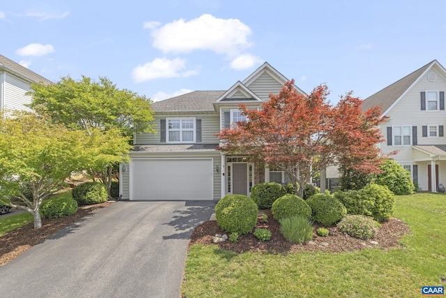 3080 Morewood Ln, Charlottesville, VA 22901 - view of front of home with asphalt driveway, a garage, a front lawn, and a shingled roof