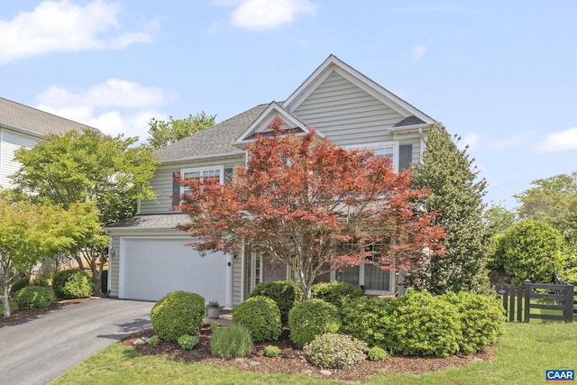 3080 Morewood Ln, Charlottesville, VA 22901 - view of property hidden behind natural elements featuring a garage and asphalt driveway