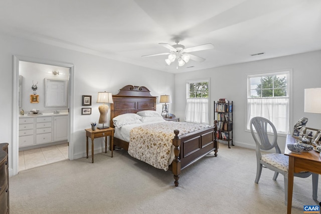 3080 Morewood Ln, Charlottesville, VA 22901 - bedroom with light carpet, baseboards, ensuite bathroom, ceiling fan, and a sink