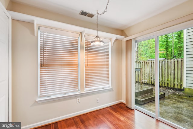 8 Ashford Ct, Annapolis, MD 21403 - unfurnished dining area with baseboards and wood finished floors